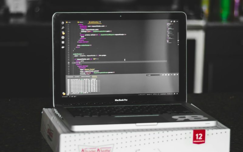 black laptop computer with box